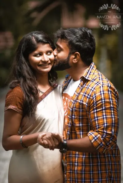 Candid close-up of a smiling couple during a pre-wedding shoot